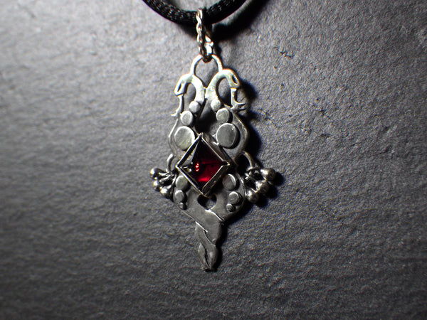 Serpenton Pendant with Pyramidal Garnet
